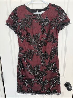 Dress the Population Burgundy Mini Dress with Black Sequin Leaf Appliqué